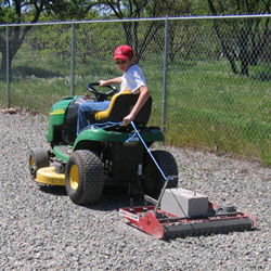 A person riding a lawn mower